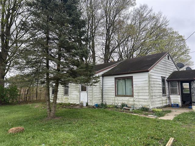 front view picture of 11620 D Drive S, Ceresco, MI. 49033