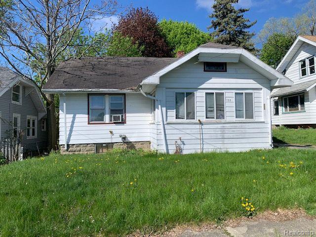 front view picture of 733 Cadillac Street, Flint, MI. 48504
