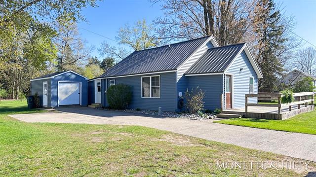 front view picture of 3266 Holton Road, Twin Lake, MI. 49457