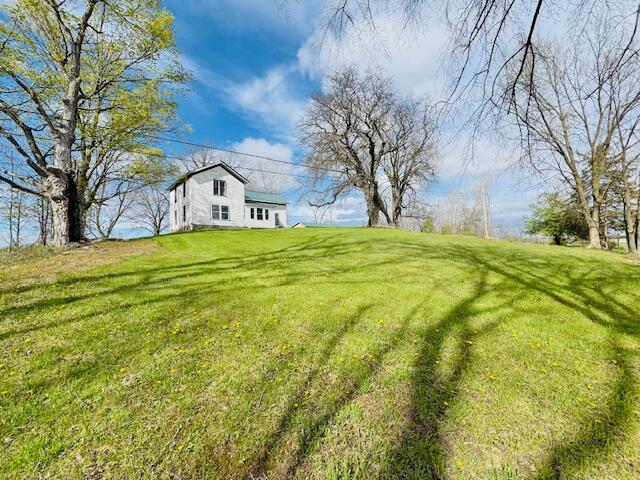 front view picture of 6828 W Clarksville Road, Clarksville, MI. 48815