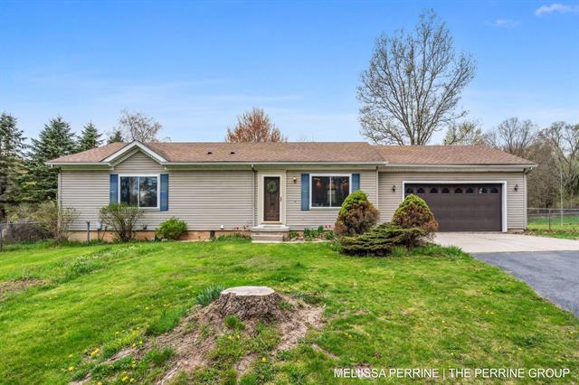 front view picture of 8611 Shaner Avenue Ne, Rockford, MI. 49341