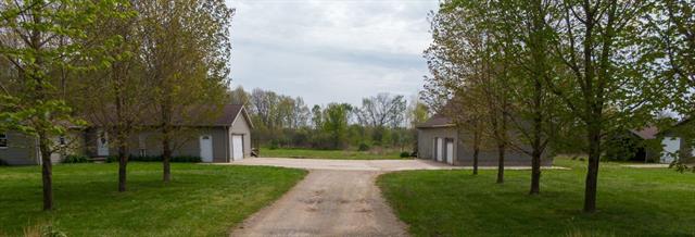 front view picture of 15105 Carpenter Road, Three Oaks, MI. 49128
