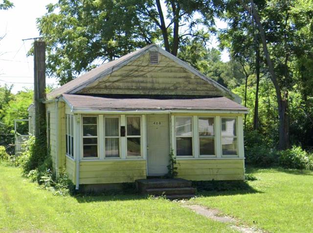 front view picture of 408 Fulton Street, Buchanan, MI. 49107