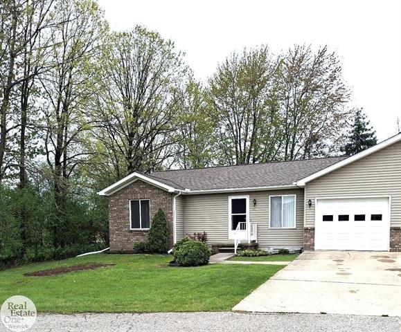 front view picture of 261 Huron Lane, Marine City, MI. 48039