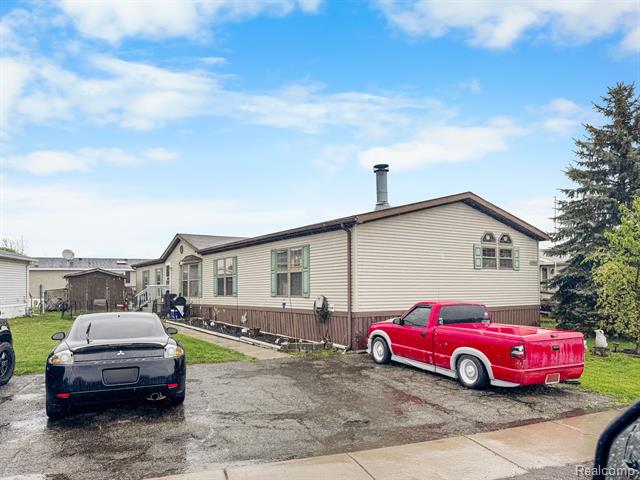 front view picture of 9080 Greentree Drive, Newport, MI. 48166