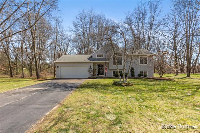 front view picture of 145 Timmer Drive Ne, Sparta, MI. 49345