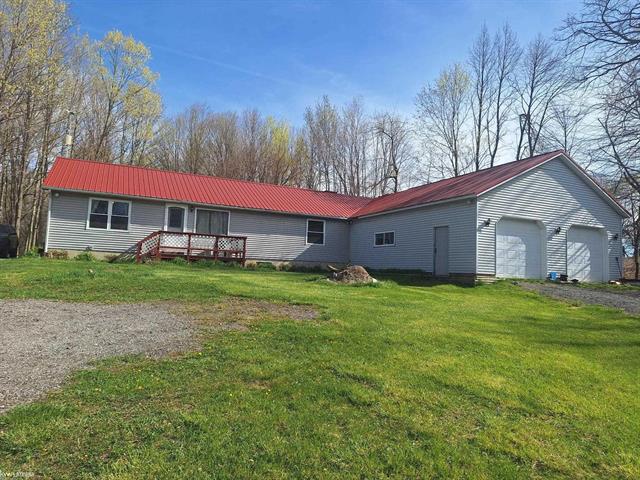 front view picture of 3123 Phelps Lake Road, Mayville, MI. 48744