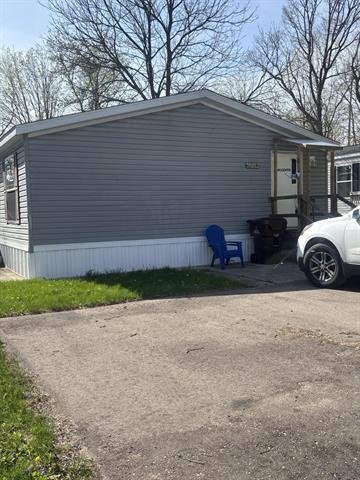 front view picture of 6704 Mill Stream Lane, Lansing, MI. 48911