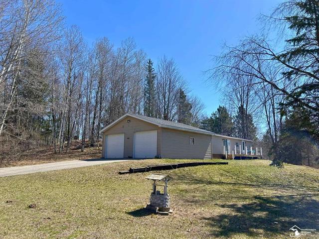 front view picture of 9052 Miramichi Drive, Evart, MI. 49631