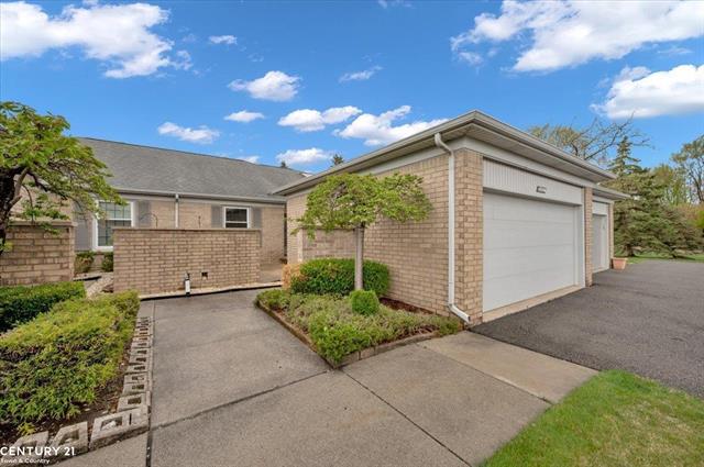 front view picture of 48440 Milonas Drive, Utica, MI. 48315
