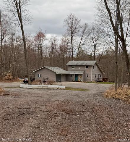 front view picture of 14510 Washburn Road, Otter Lake, MI. 48464