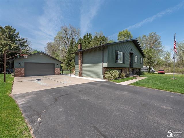 front view picture of 13725 Grafton Road, Carleton, MI. 48117