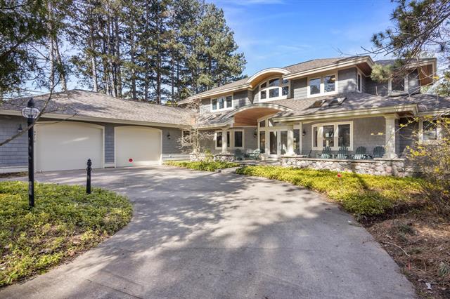 front view picture of 9710 Cherry Avenue, Rapid City, MI. 49676