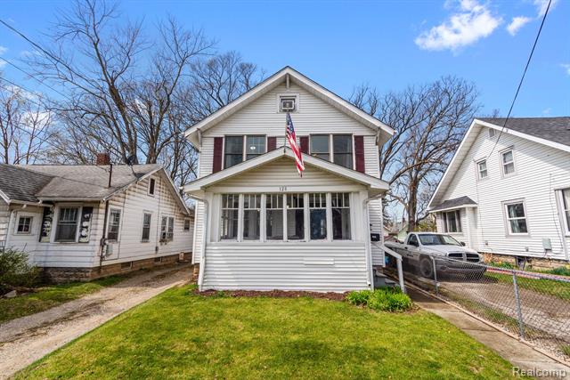 front view picture of 128 S Foster Avenue, Lansing, MI. 48912