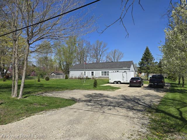 front view picture of 10537 Willis Road, Willis, MI. 48191