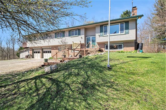 front view picture of 4122 Sylvan Road, Grass Lake, MI. 49240