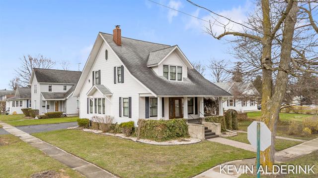 front view picture of 201 N Woodworth Street, Corunna, MI. 48817