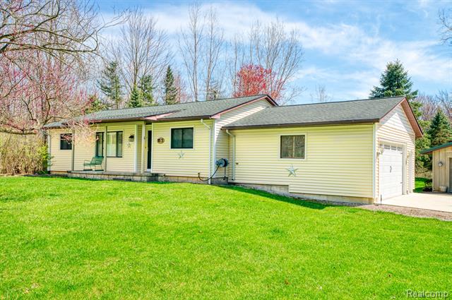 front view picture of 9333 W Coon Lake Road, Gregory, MI. 48137