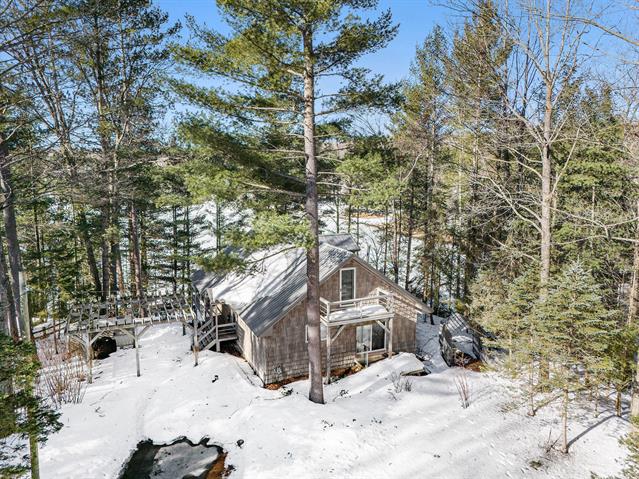 front view picture of 12298 Runyon Lane Ne, Kalkaska, MI. 49646