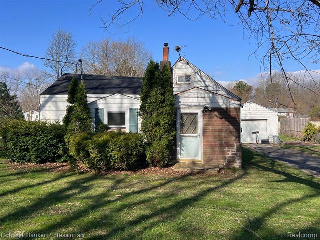 front view picture of 1124 George Street, Owosso, MI. 48867