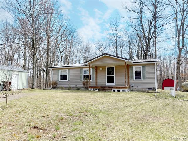 front view picture of 10472 N Athey Avenue, Harrison, MI. 48625