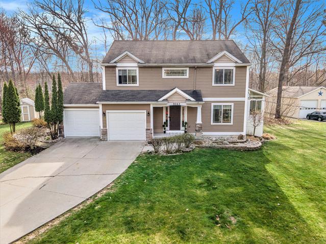 front view picture of 9062 Elstner Avenue Ne, Rockford, MI. 49341
