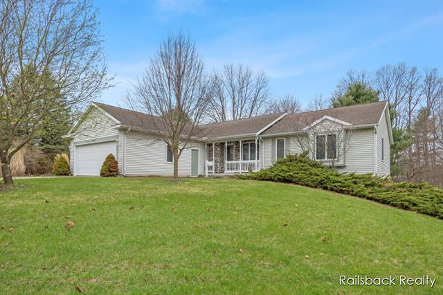 front view picture of 11647 Little Cedar Creek, Sparta, MI. 49345