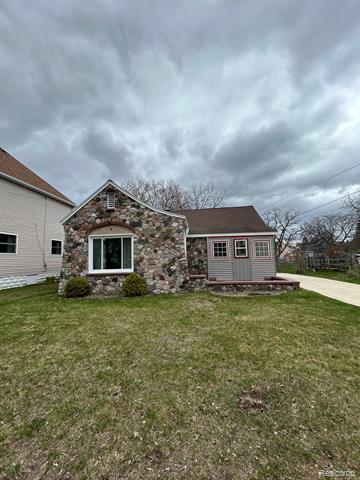 front view picture of 416 Church Street, East Tawas, MI. 48730