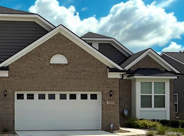 front view picture of 16136 Conifer Lane, Clinton Township, MI. 48038