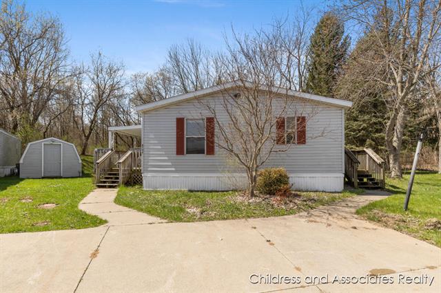 front view picture of 8749 Country View Circle, Sparta, MI. 49345