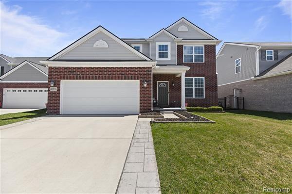 front view picture of 41318 Rugosa Drive, Clinton Township, MI. 48038
