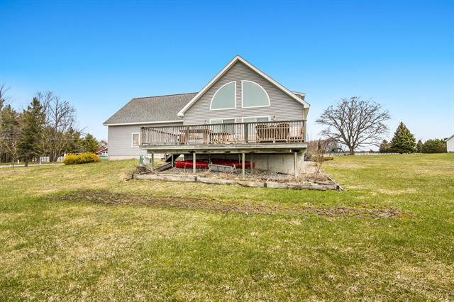 front view picture of 13019 Elk Tip Drive, Rapid City, MI. 49676