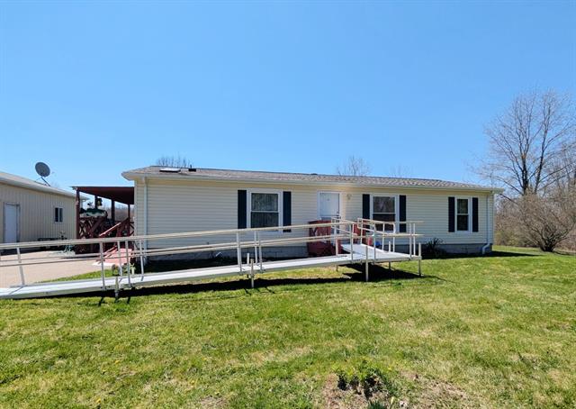 front view picture of 9335 Birch Run Road, Millington, MI. 48746