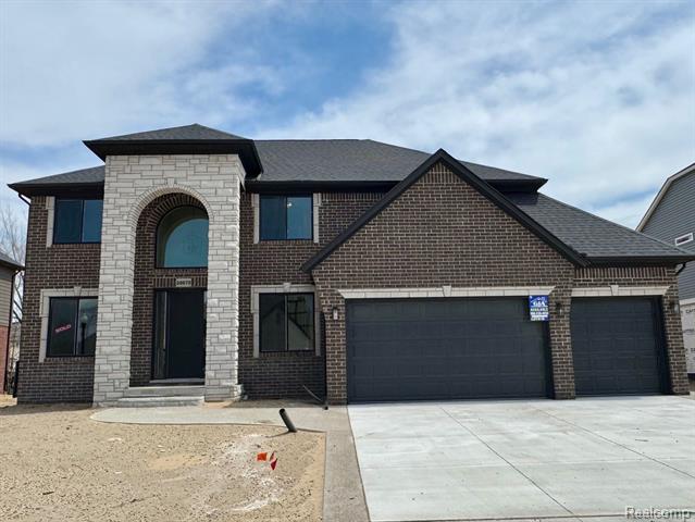 front view picture of 50670 Mistwood Drive, Macomb, MI. 48042