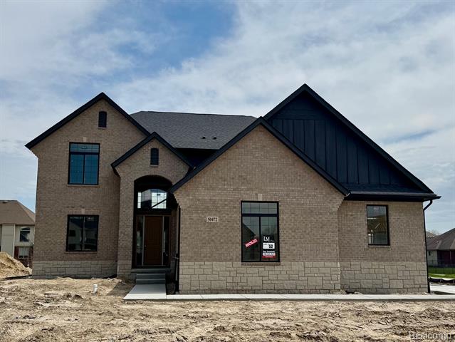front view picture of 50472 Mistwood Drive, Macomb, MI. 48042