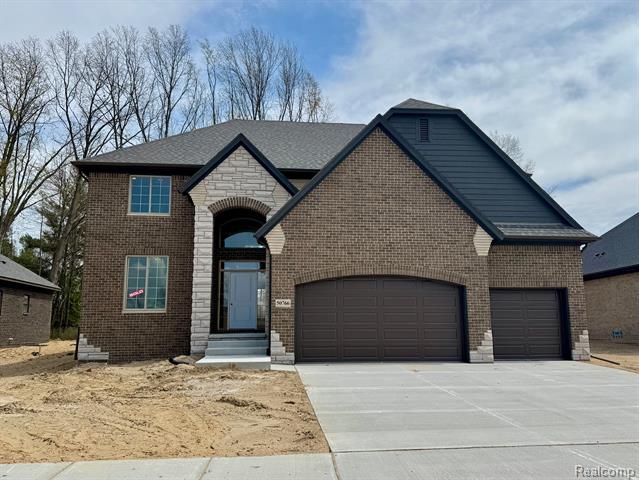 front view picture of 50766 Mistwood Drive, Macomb, MI. 48042