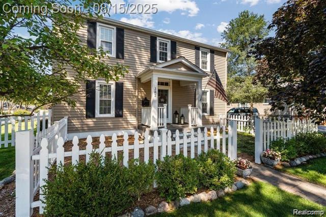 front view picture of 303 Cabinet St, Milford, MI. 48381