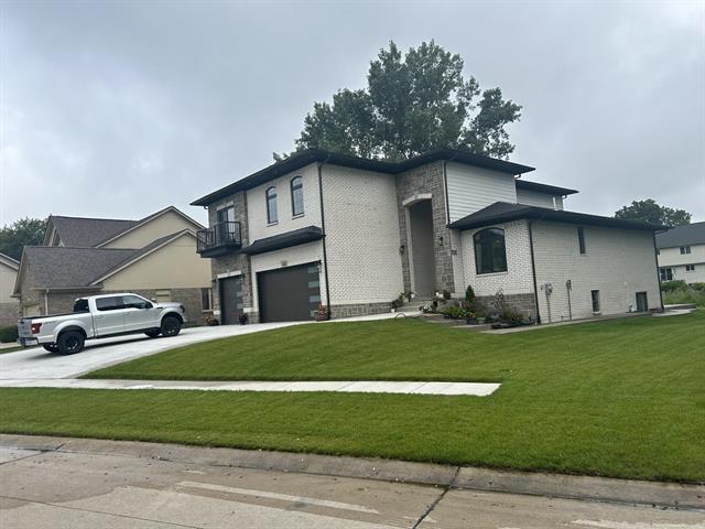 front view picture of 1683 Delta Drive, Troy, MI. 48085