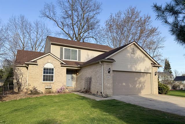 front view picture of 9465 Sandlewood Court, Whitmore Lake, MI. 48189