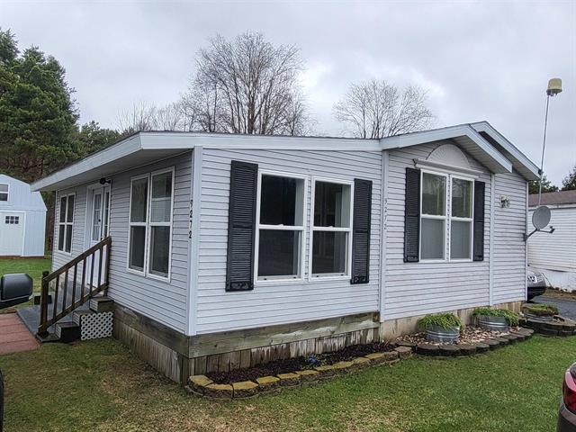 front view picture of 9272 Elsie Avenue, Bear Lake, MI. 49614