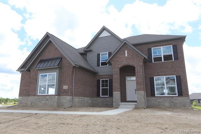 front view picture of 11976 Moore Lane, Washington, MI. 48094