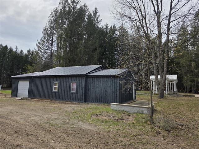front view picture of 6035 N Custer Road, Free Soil, MI. 49411