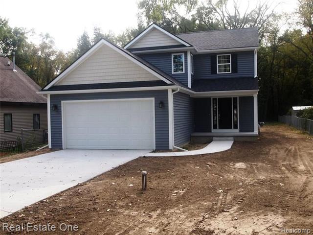 front view picture of 8915 Gittins Blvd, Commerce Township, MI. 48382