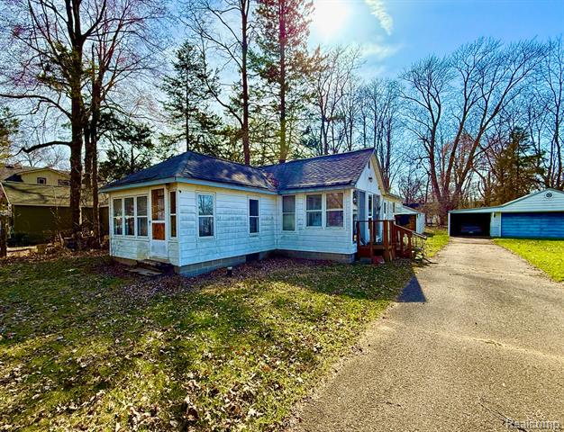 front view picture of 1874 Portlock Ave, Commerce Township, MI. 48382