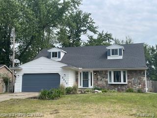 front view picture of 8826 Cooley Lake Rd, White Lake, MI. 48386