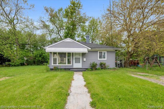 front view picture of 228 Hughes Ave, Pontiac, MI. 48341