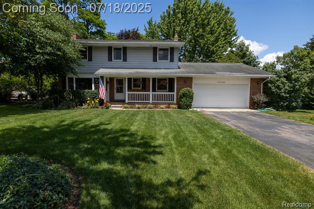 front view picture of 10420 Cedar Pointe Dr, White Lake, MI. 48386