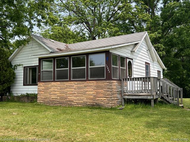 front view picture of 13063 S Shaftsburg Road, Perry, MI. 48872