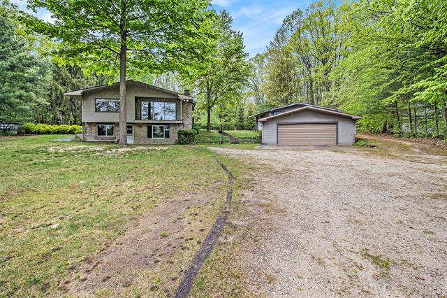 front view picture of 6658 W Jagger Road, Ludington, MI. 49431