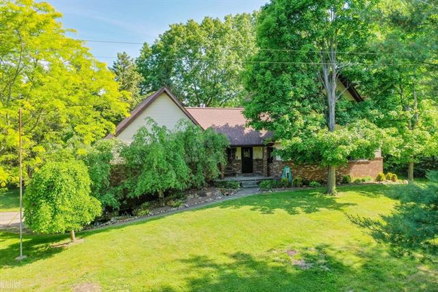 front view picture of 6499 Tubspring Road, Almont, MI. 48003